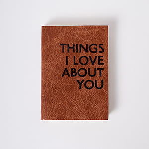 brown and black leather Thing I Love About You printed decor thumbnail
