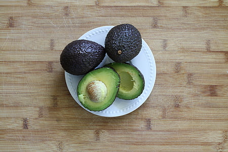sliced avocado on white ceramic plate thumbnail