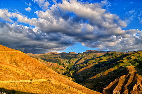 brown rocky mountain during daytime thumbnail
