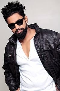 man wearing black leather jacket thumbnail