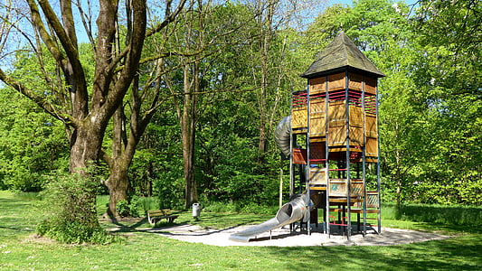 brown and gray wooden house near the tree thumbnail