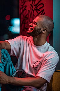 Smiling Man Wearing White Crew-neck T-shirt thumbnail