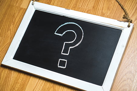 closeup photo of black board on wooden surface thumbnail