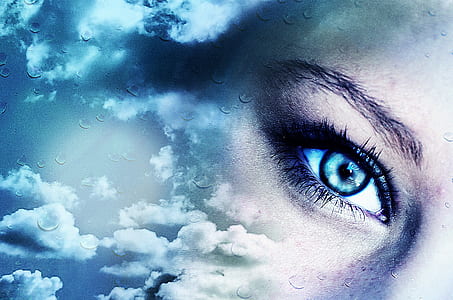 poster of woman's eye and clouds thumbnail