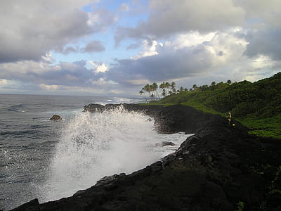 waves crashing on cliff thumbnail