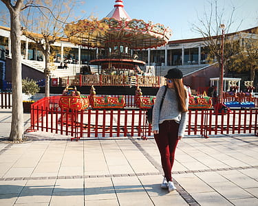 Woman Wearing Gray Sweater and Maroon Pants thumbnail