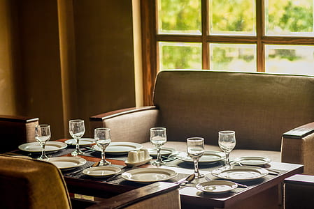 clear wine glass on dining table thumbnail