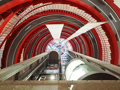 low-angle photography of white elevators thumbnail