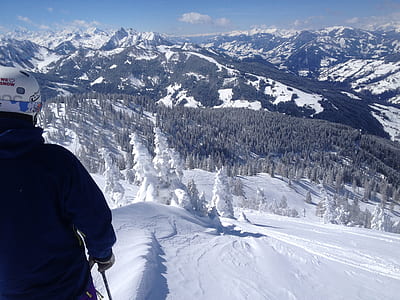 man skiing on snow field mountain thumbnail