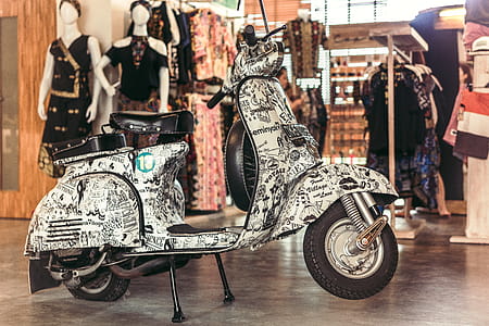 White Motor Scooter thumbnail