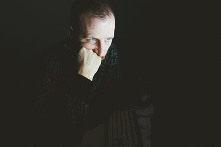 man thinking fronting on monitor thumbnail