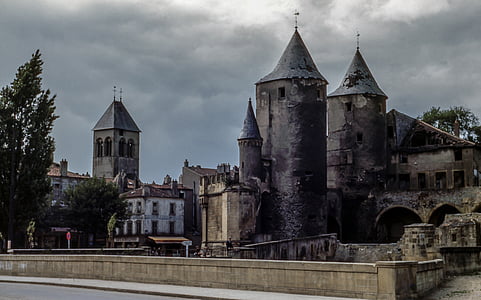 brown castle under the cloudy sky thumbnail