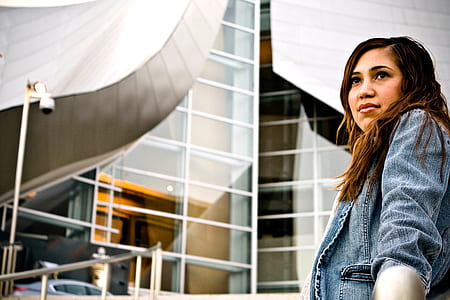 woman wearing blue denim jacket thumbnail