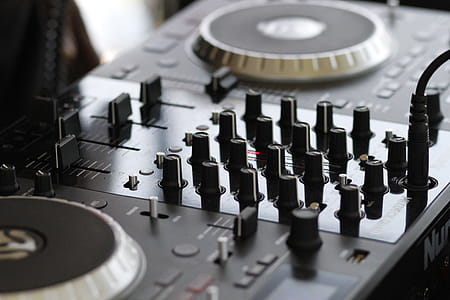 Selective Focus of Black and Silver Terminal Mixer Knobs thumbnail