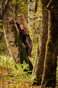 photo of woman wearing black dress thumbnail