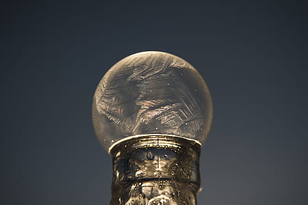 bubble on tip of clear glass bottle thumbnail