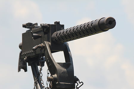 switched off black rifle under blue sky thumbnail