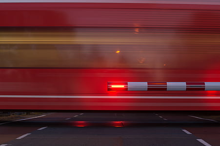timelapse photography of red train thumbnail