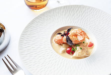 cooked food served on white plate thumbnail