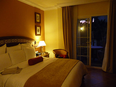 room with turned on table lamp thumbnail