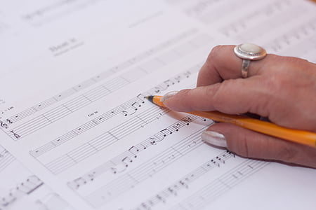 person reading musical notes thumbnail