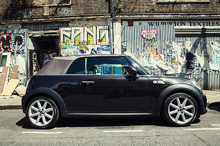 Wide-angle shot of a Mini car, image captured on the streets of East London, England thumbnail