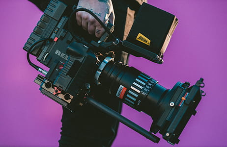 person holding professional camera thumbnail