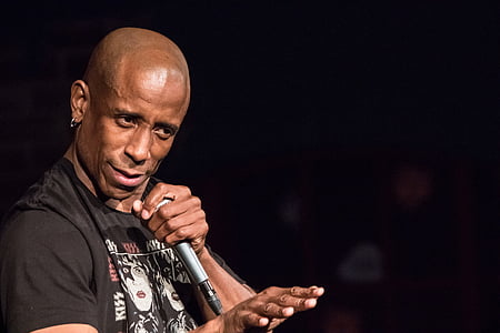 man holding microphone thumbnail