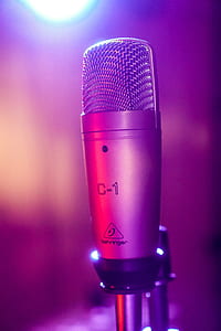 gray condenser microphone on gray stand thumbnail