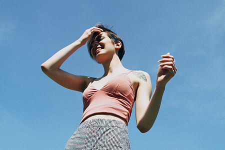 woman touching her forehead thumbnail