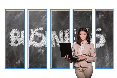 woman holding black laptop computer thumbnail