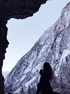 woman standing near mountain thumbnail