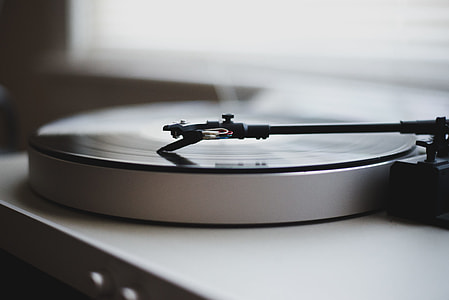 selective photography of gray turntable thumbnail