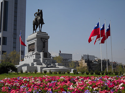 man riding horse monument near Texas flags thumbnail