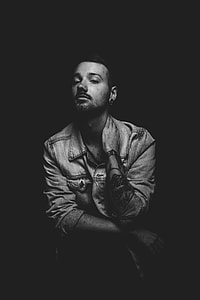 man sitting on chair thumbnail