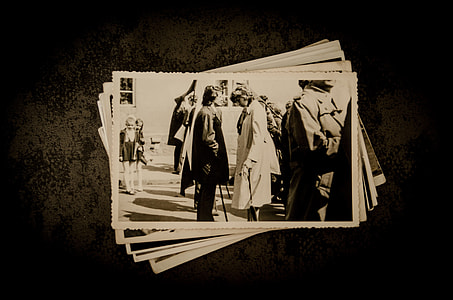 sepia photo of man in front of a woman thumbnail