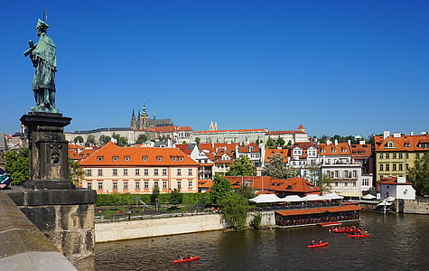 red boats in water thumbnail