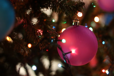 pink christmas bauble on selective focus photography thumbnail