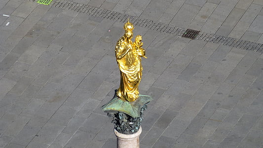 brass-color religious statue thumbnail