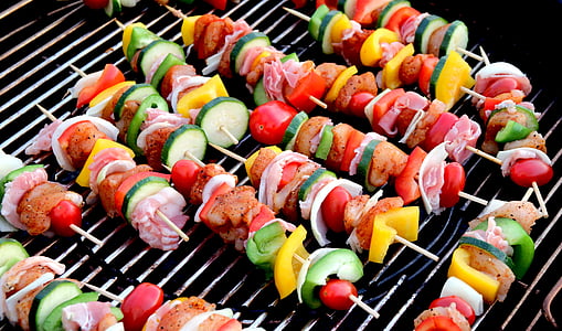 stick kebab on grilling machine thumbnail
