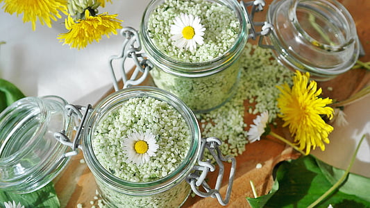 two glass jars filled with seeds thumbnail