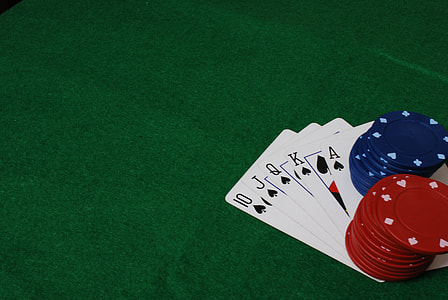 royal flush of spades with red and blue poker chips thumbnail