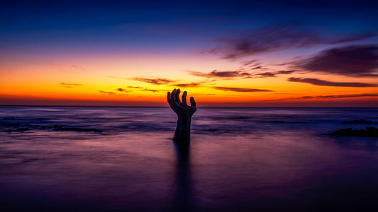 hand on body of water thumbnail