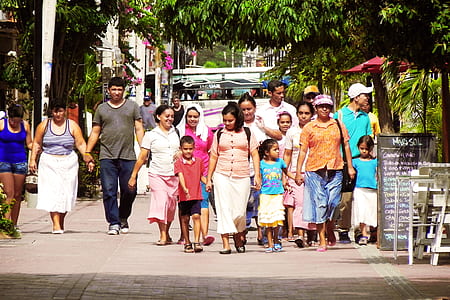 group of people walking on sidewalk during daytime thumbnail