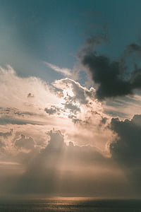 photography of clouds with crepuscular rays thumbnail