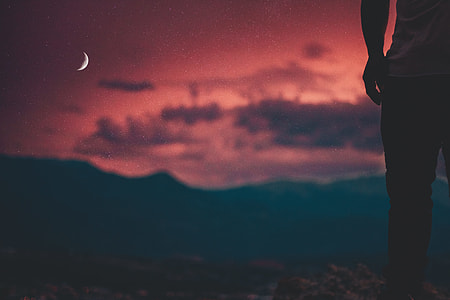 person standing on mountain thumbnail
