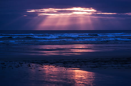 Sunrays on beach during sunset thumbnail