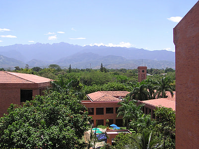 University Icesi and farallones of Cali with mountains behind in the landscape in Cali, Colombia thumbnail