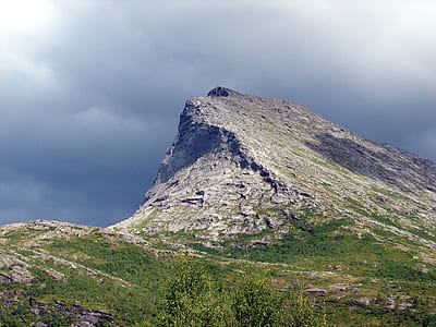 mountain under clouds during daytime thumbnail