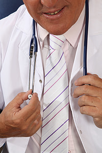 man holding black and gray sphygmomanometer\ thumbnail